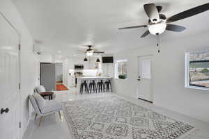 casita that is inside  barndominium. Living room with recessed lighting and ceiling fan