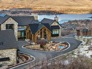 View of asphalt street featuring curbs