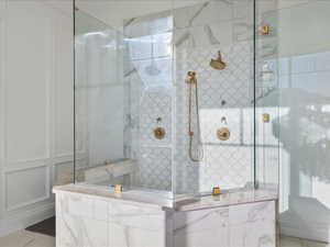 Bathroom with tiled shower
