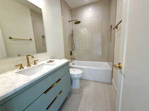 Full bathroom featuring vanity and washtub / shower combination