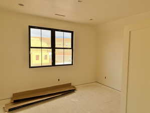 Spare room featuring recessed lighting