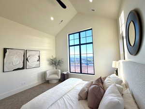 Carpeted bedroom featuring ceiling fan and recessed lighting