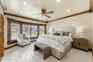 Bedroom with ornamental molding, a ceiling fan, light carpet, and recessed lighting
