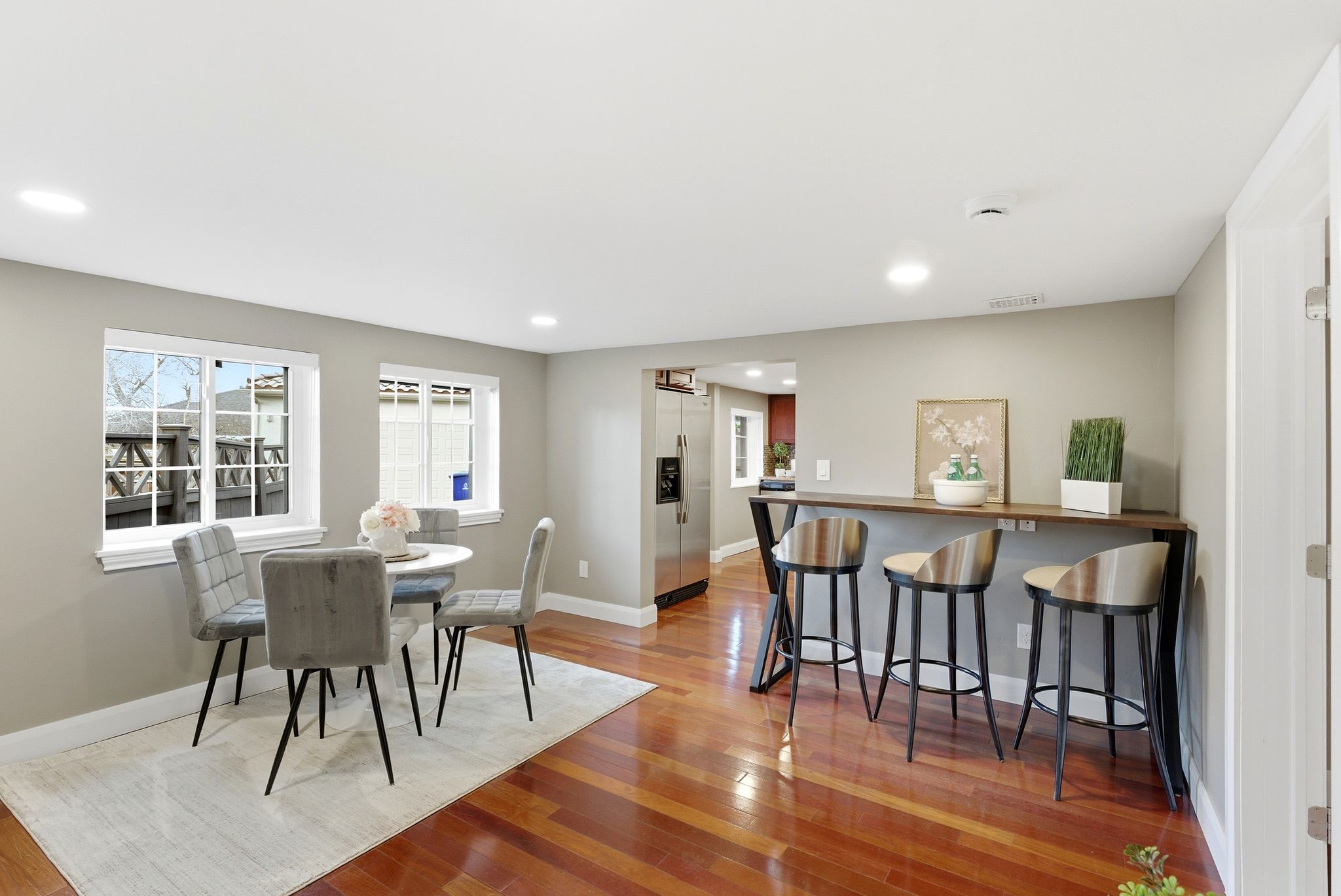 Dining area featuring light wood-type flooring and recessed lighting