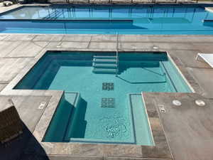 Outdoor pool with a patio area