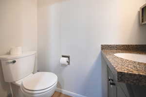 Bathroom featuring vanity and light wood-style flooring