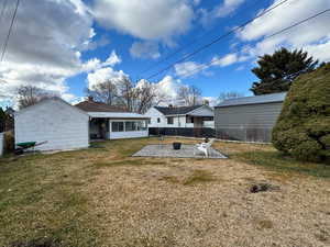 Back of property with a patio area