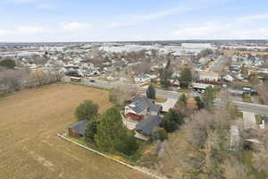 View of property location with nearby suburban area