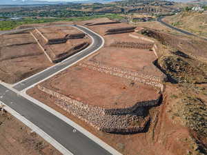 Aerial view of property's location featuring rural landscape and a mountainous background