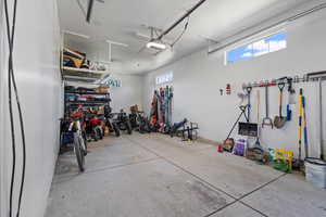 Garage featuring a garage door opener