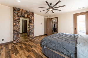 Bedroom featuring hardwood / wood-style floors and ceiling fan