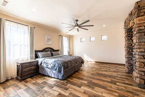Bedroom featuring wood finished floors, a ceiling fan, and recessed lighting