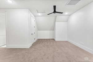 Bonus room featuring light carpet, ceiling fan, lofted ceiling, and recessed lighting