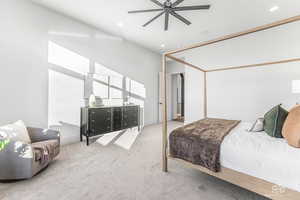 Bedroom featuring carpet flooring, ceiling fan, and recessed lighting