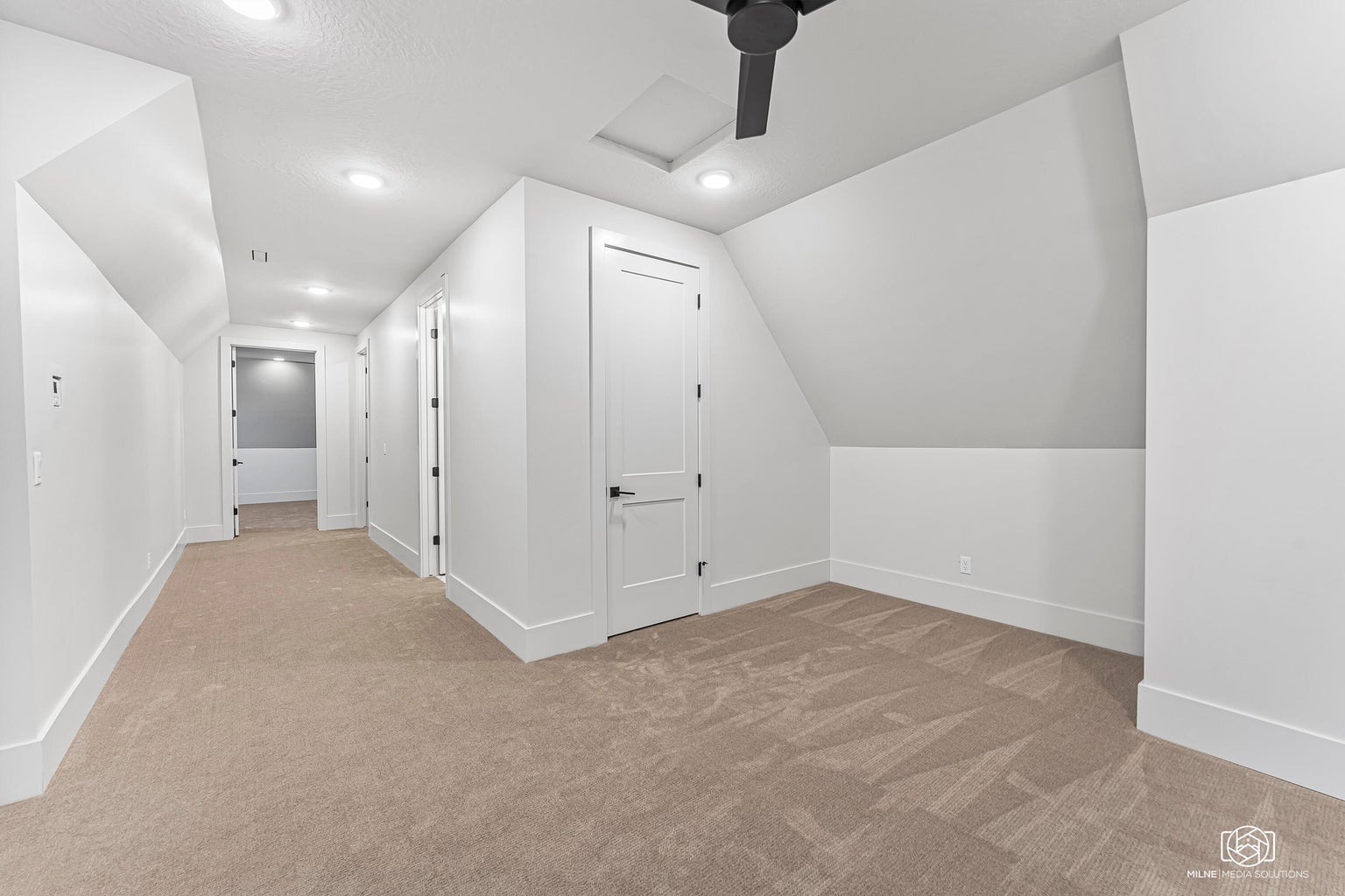 Bonus room featuring light colored carpet, ceiling fan, and recessed lighting