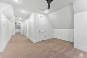 Bonus room featuring light colored carpet, ceiling fan, and recessed lighting