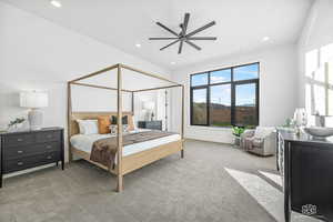 Bedroom with light carpet, ceiling fan, and recessed lighting