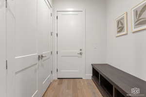 Mudroom featuring light wood-type flooring