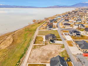 Aerial view of residential area with a water and mountain view