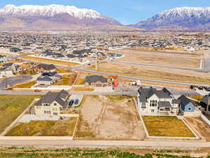 Aerial view of residential area featuring mountains