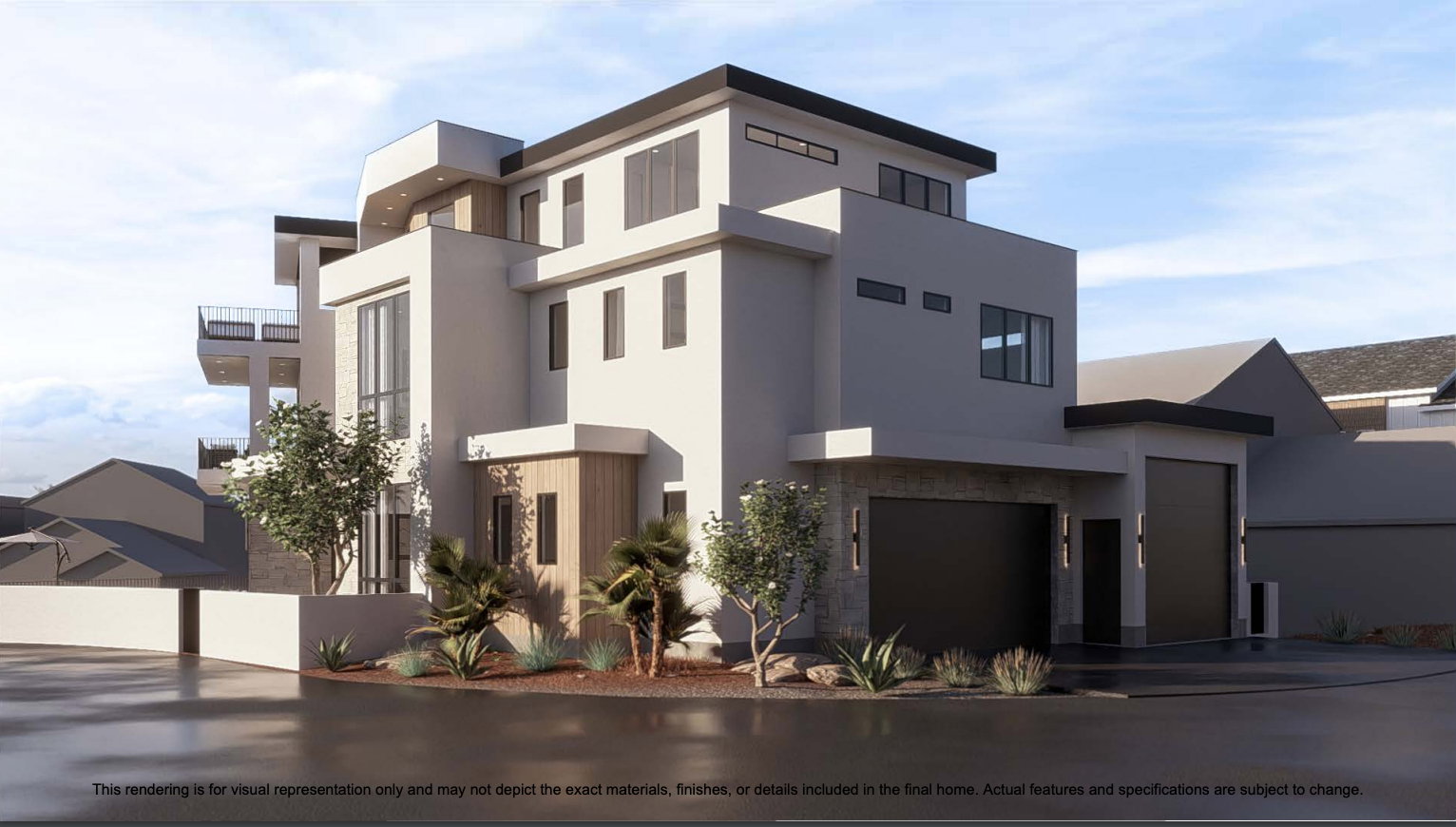 View of building exterior with a garage and driveway