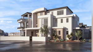 View of front of property featuring stone siding, a fenced front yard, stucco siding, and a balcony
