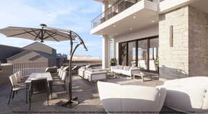 Patio / terrace with a patio area and an outdoor living / dining area