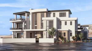 View of front of property with stone siding, a gate, a fenced front yard, a balcony, and stucco siding
