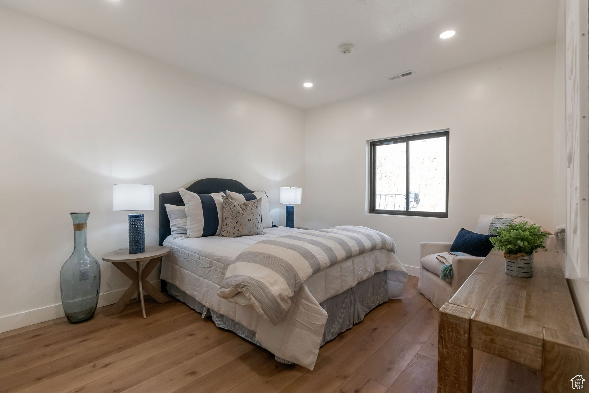Bedroom featuring wood-type flooring and recessed lighting