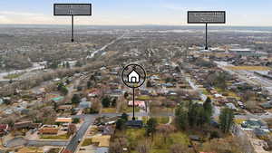 Aerial overview of property's location with nearby suburban area