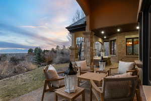 View of patio with an outdoor hangout area