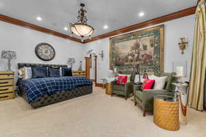 Bedroom featuring arched walkways, carpet, ornamental molding, and recessed lighting