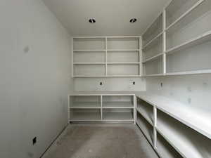 Large walk-in pantry with countertops, electrical outlets and plenty of storage