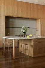 Gorgeous Marble Countertops with Warm Wood Cabinetry