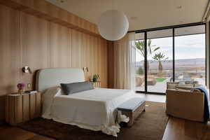 Cozy Primary Bedroom with Incredible Views, Gas Fireplace, Large Slider Leading to the Back Patio, and Speakers