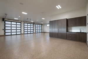 Oversized Garage with Heat & A/C, Cabinetry, Two 220V Outlets, and Prewiring for Solar