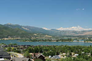 Aerial view of residential area with a water and mountain view