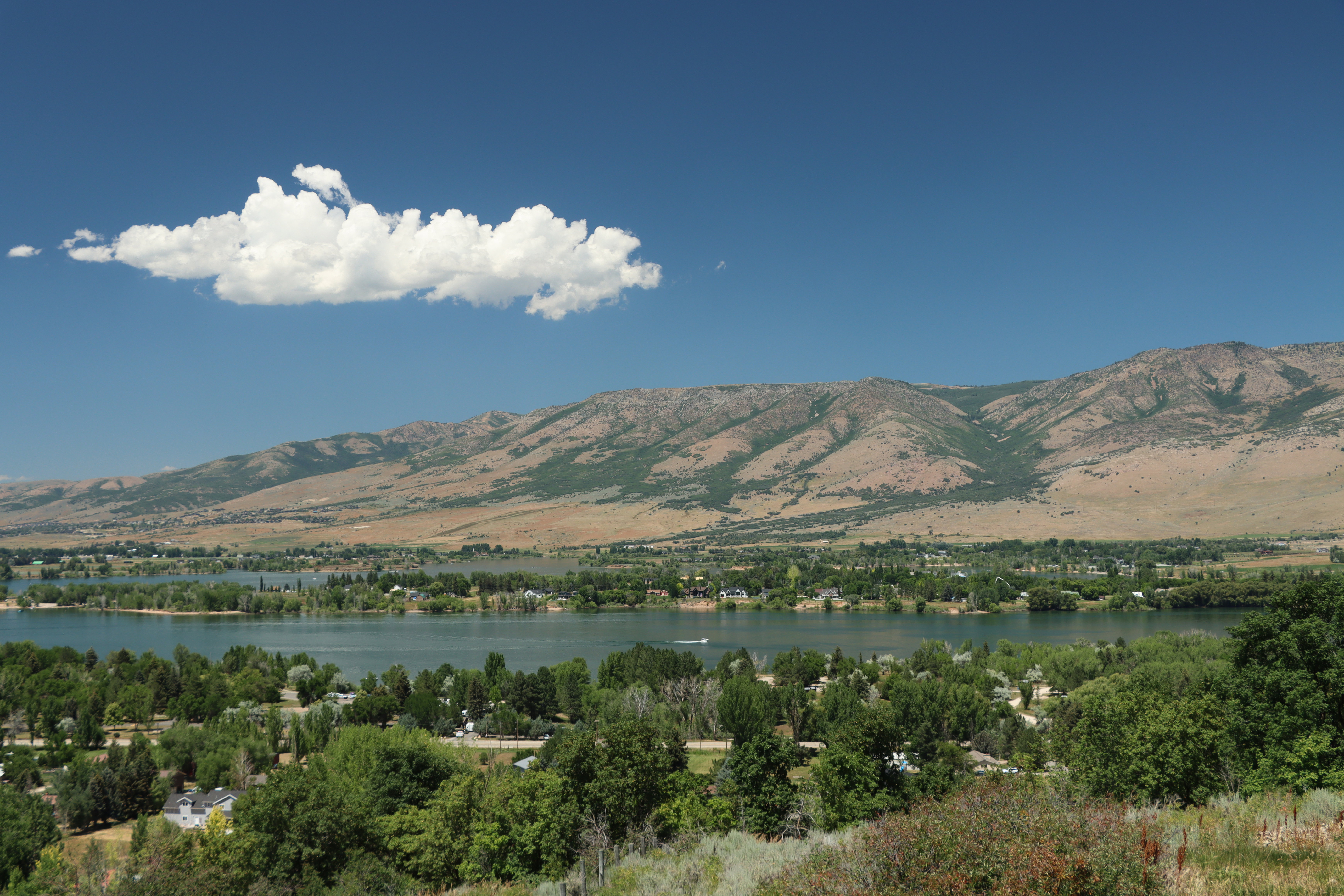 View of mountain backdrop with a large body of water