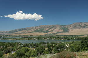 View of mountain backdrop with a large body of water