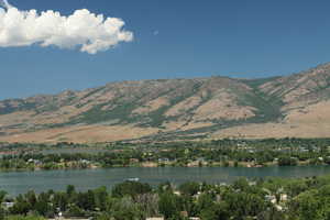 View of mountain background featuring a large body of water