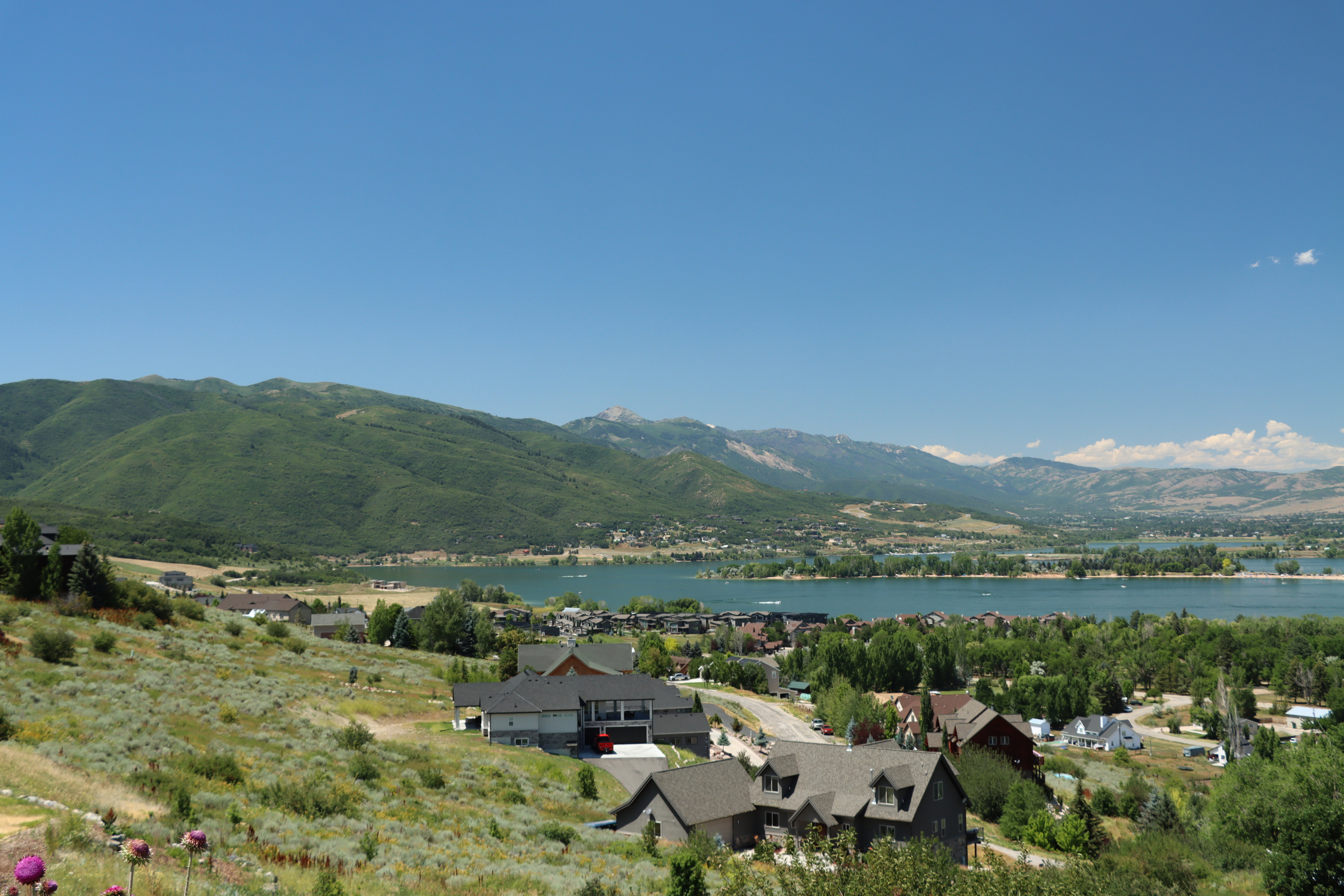 View of mountain background featuring a large body of water