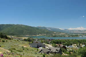 View of mountain background featuring a large body of water