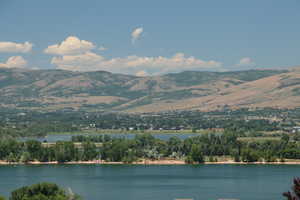 View of mountain background featuring a large body of water