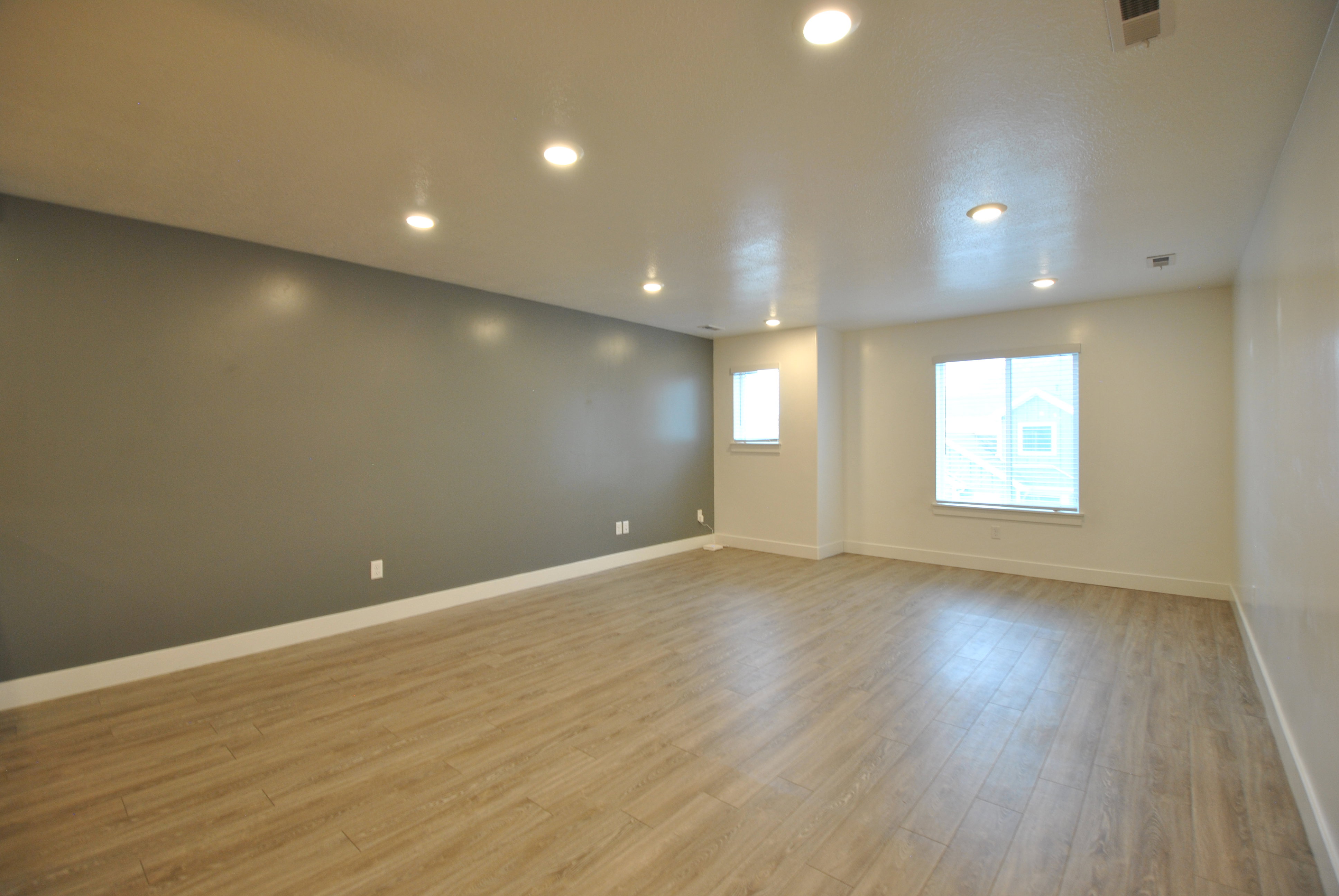 Great room featuring recessed lighting and light wood finished floors
