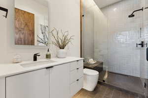 Bathroom with a walk in shower and vanity