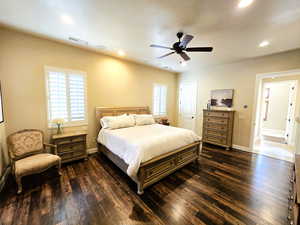 Bedroom with dark wood-style flooring, recessed lighting, and ceiling fan