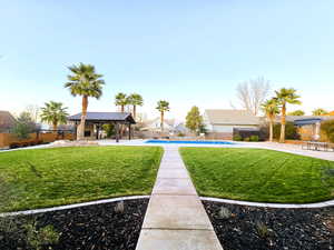 View of yard with a patio area
