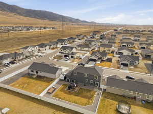 Aerial view of residential area with mountains