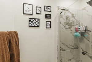 Full bathroom featuring a marble finish shower