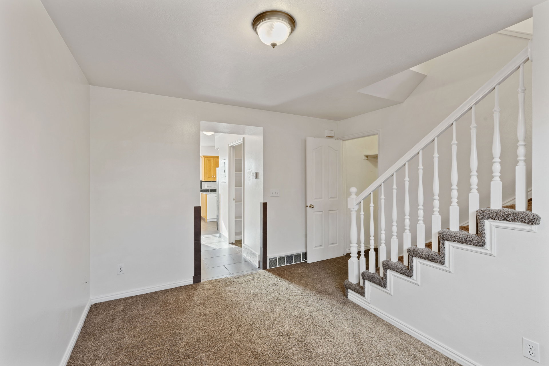 Family Room on the main floor, carpet flooring